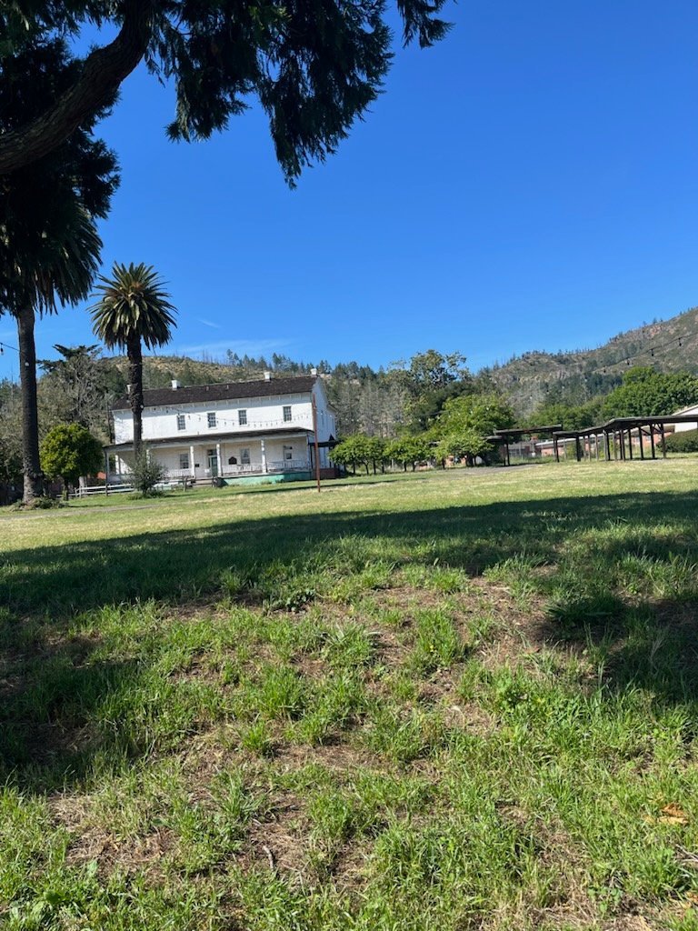 Hood Mansion and the concert grounds — view from the Levi Lloyd Stage area