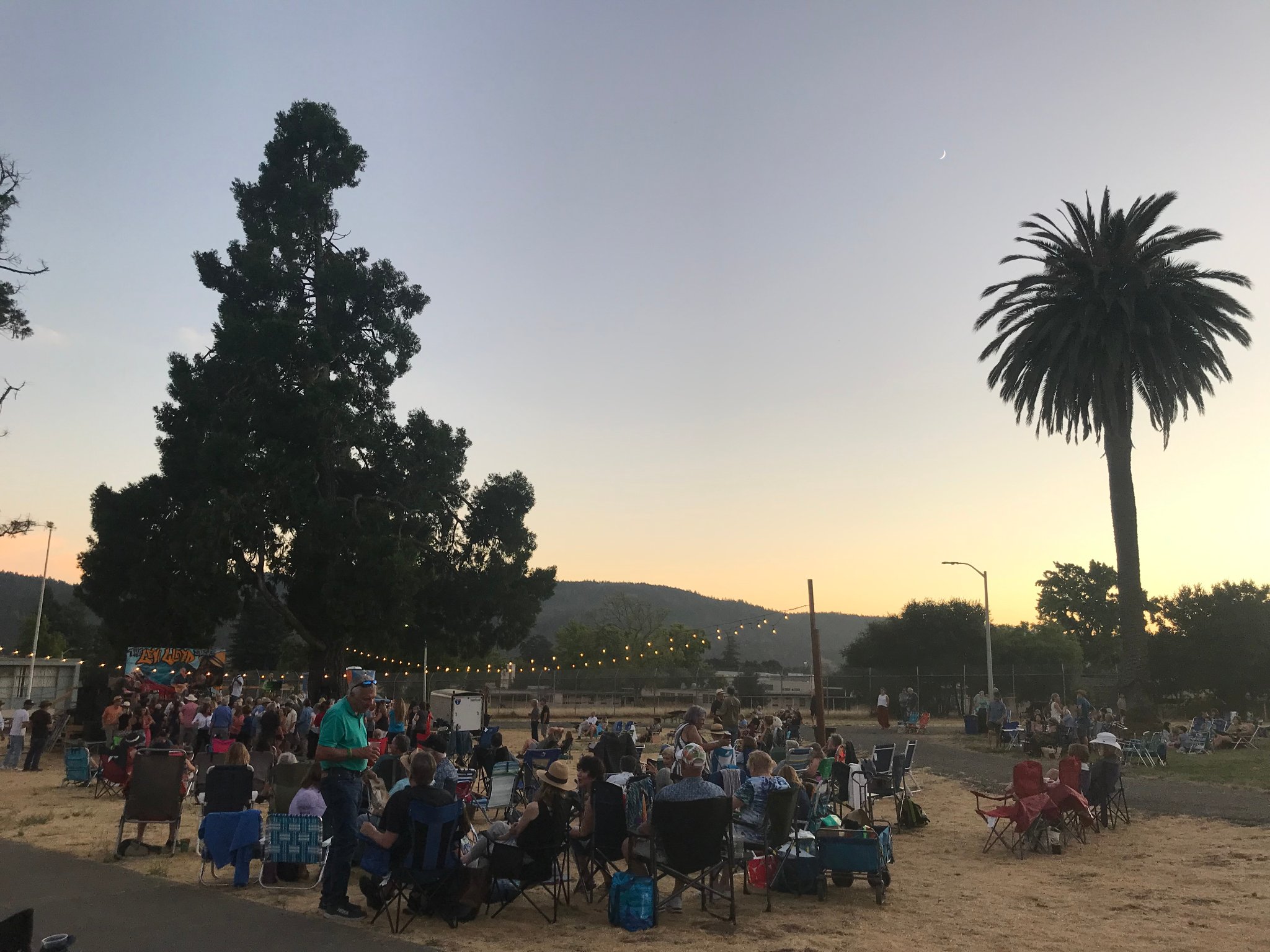 Sunset over Hood Mansion grounds — the magic hour at Fridays at the Hood